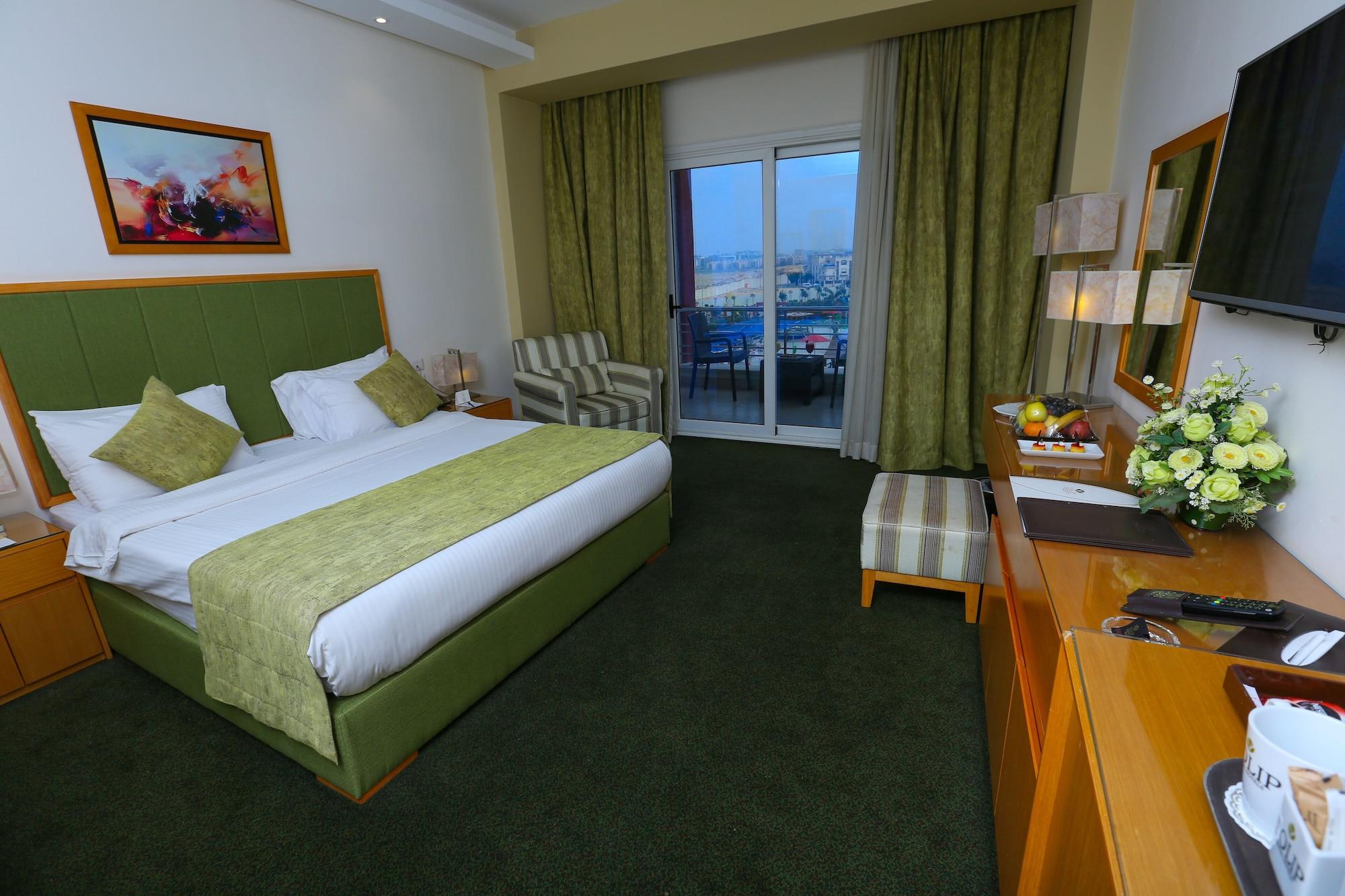 Hotel Tolip El Narges à Le Caire Extérieur photo A room at the hotel