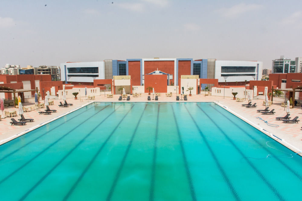 Hotel Tolip El Narges à Le Caire Extérieur photo Swimming pool at the club