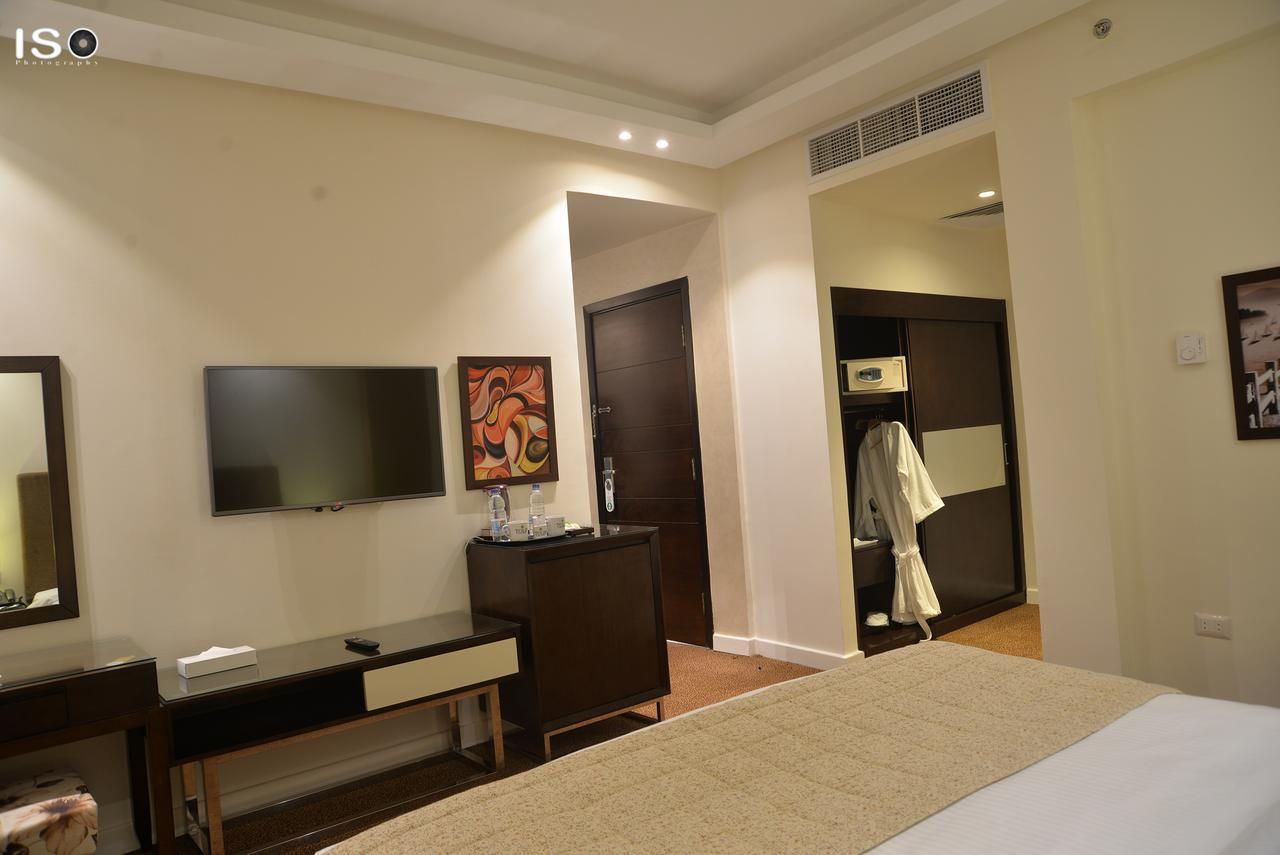 Hotel Tolip El Narges à Le Caire Extérieur photo A room at the hotel