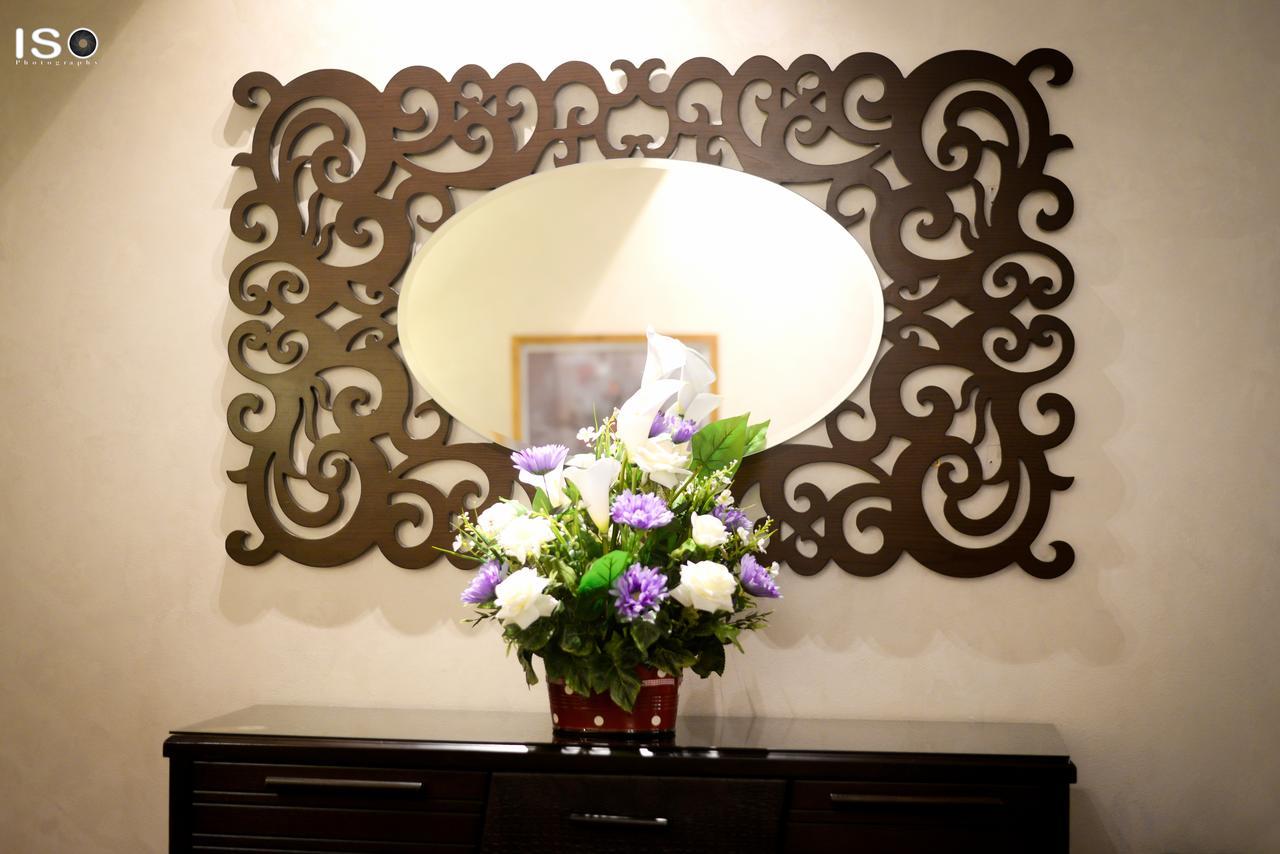Hotel Tolip El Narges à Le Caire Extérieur photo Laser cut mirror frame