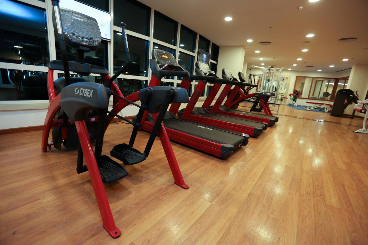Hotel Tolip El Narges à Le Caire Extérieur photo A row of treadmills